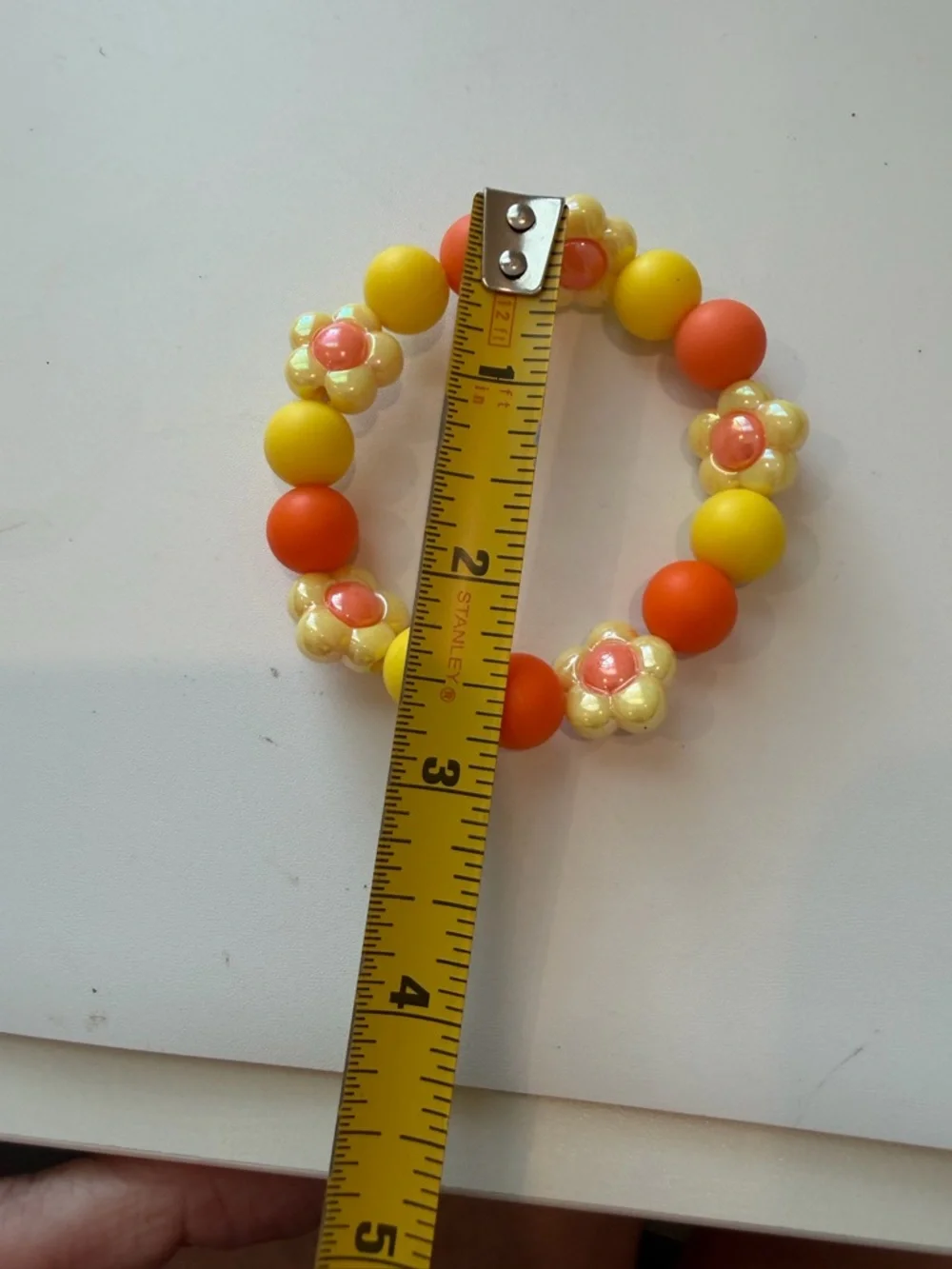 Hand Crafted Yellow and Orange Kids Flower Bead Stretch Bracelet - Picture 4 of 4